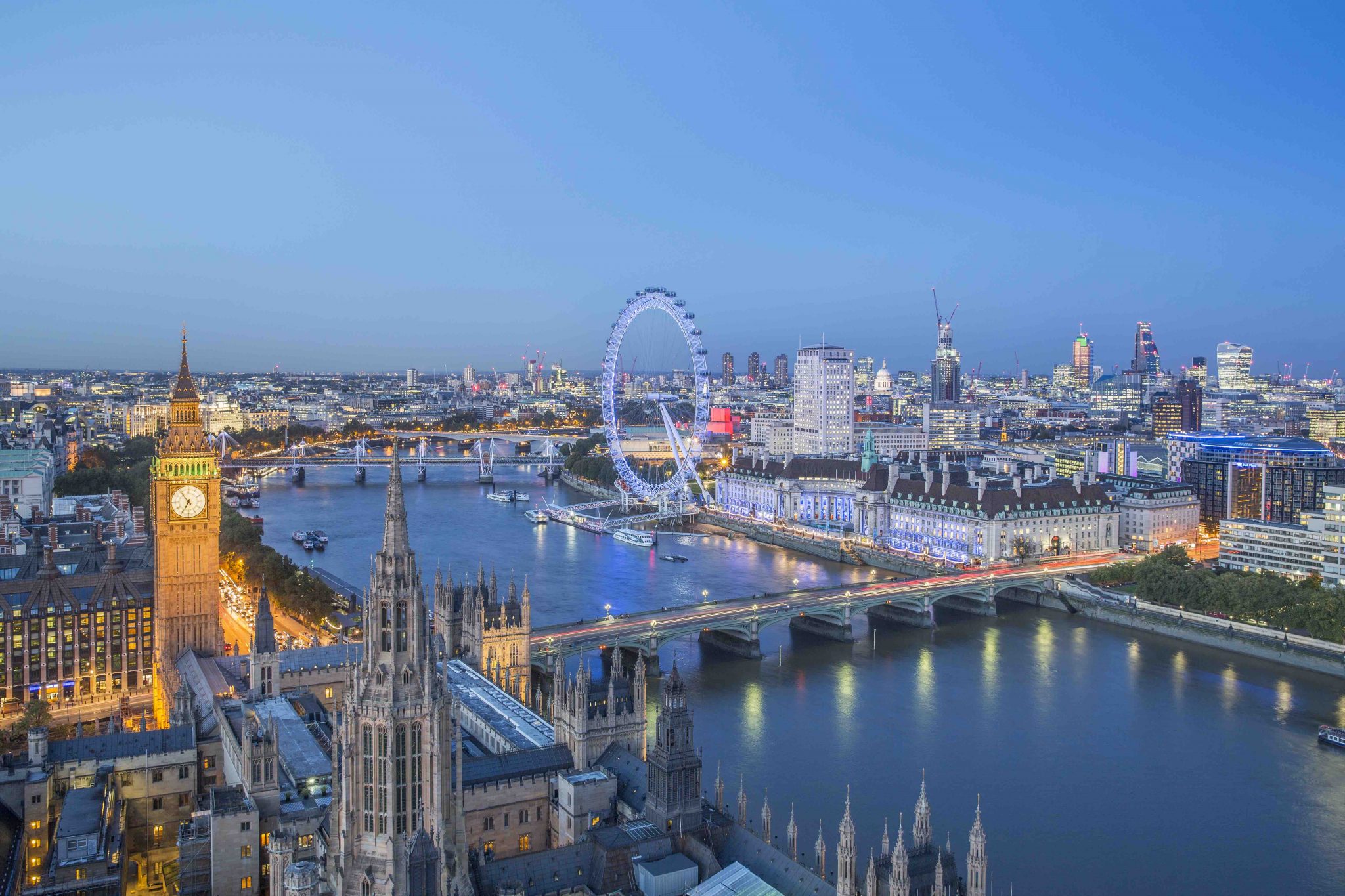 London skyline with Big ben and the London Eye at dusk Paddle Your