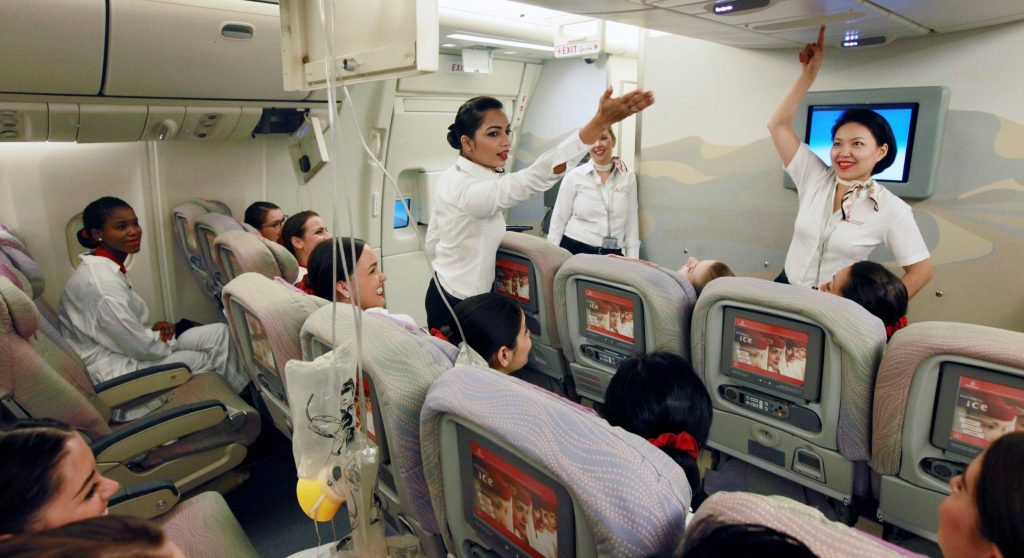 New Emirates Cabin Crew receiving practical SEP training on a mock Boeing 777. Photo Credit: Emirates