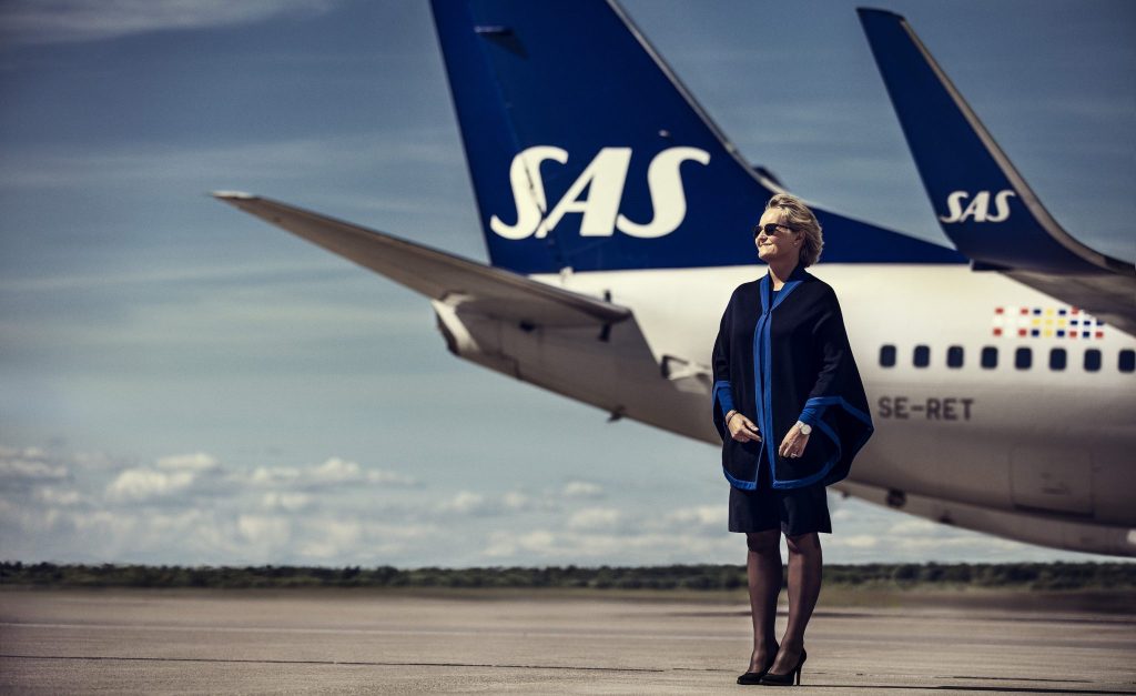 The airline Scandanavian airline will share the same uniform, logos, routes and website. Photo Credit: SAS