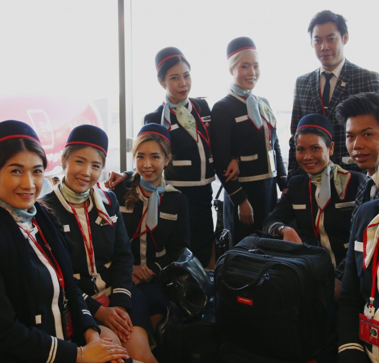 a group of people posing for a photo