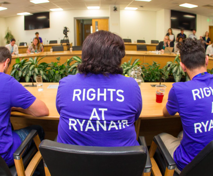 a group of people sitting at a table