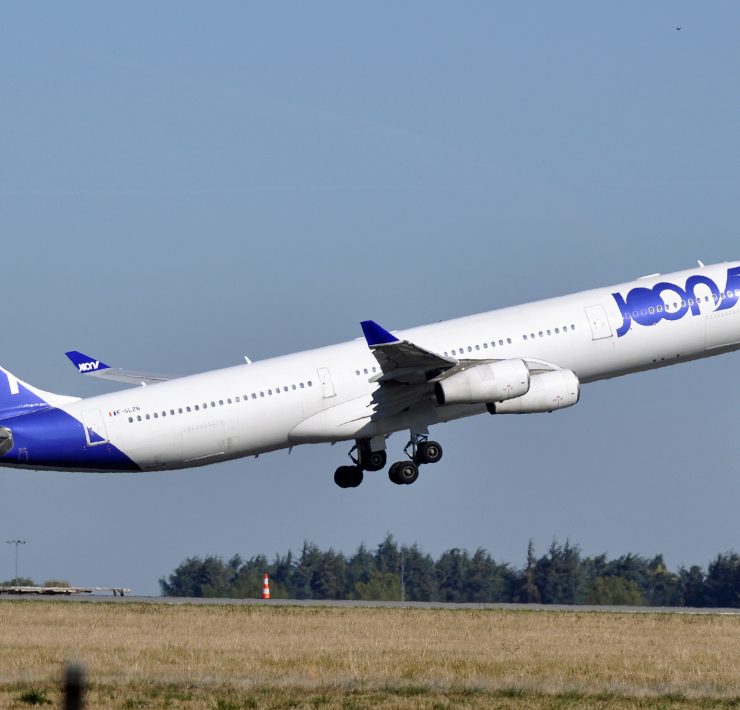 a plane taking off from a runway