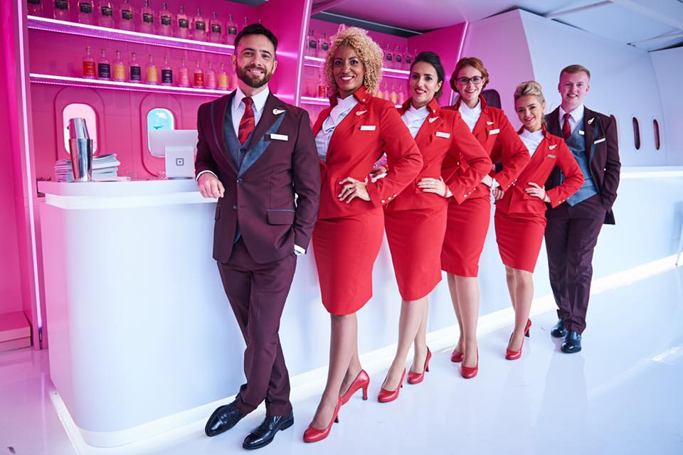 Fashion Takes Flight: Our Favorite Designer Airline Uniforms - The Points  Guy