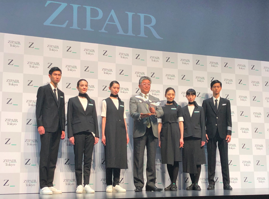 this new asymmetrical cabin crew uniform is so on trend