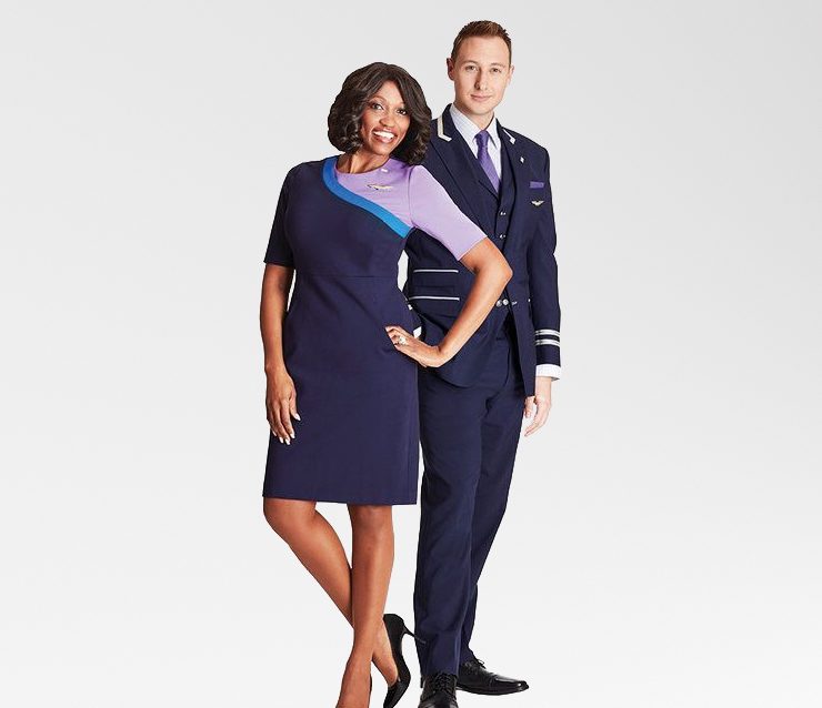 a woman and man in uniform