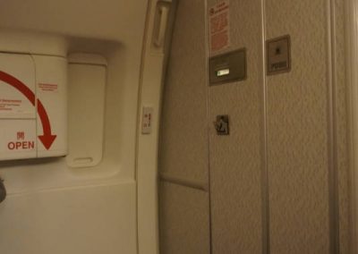 an airplane door with a sign