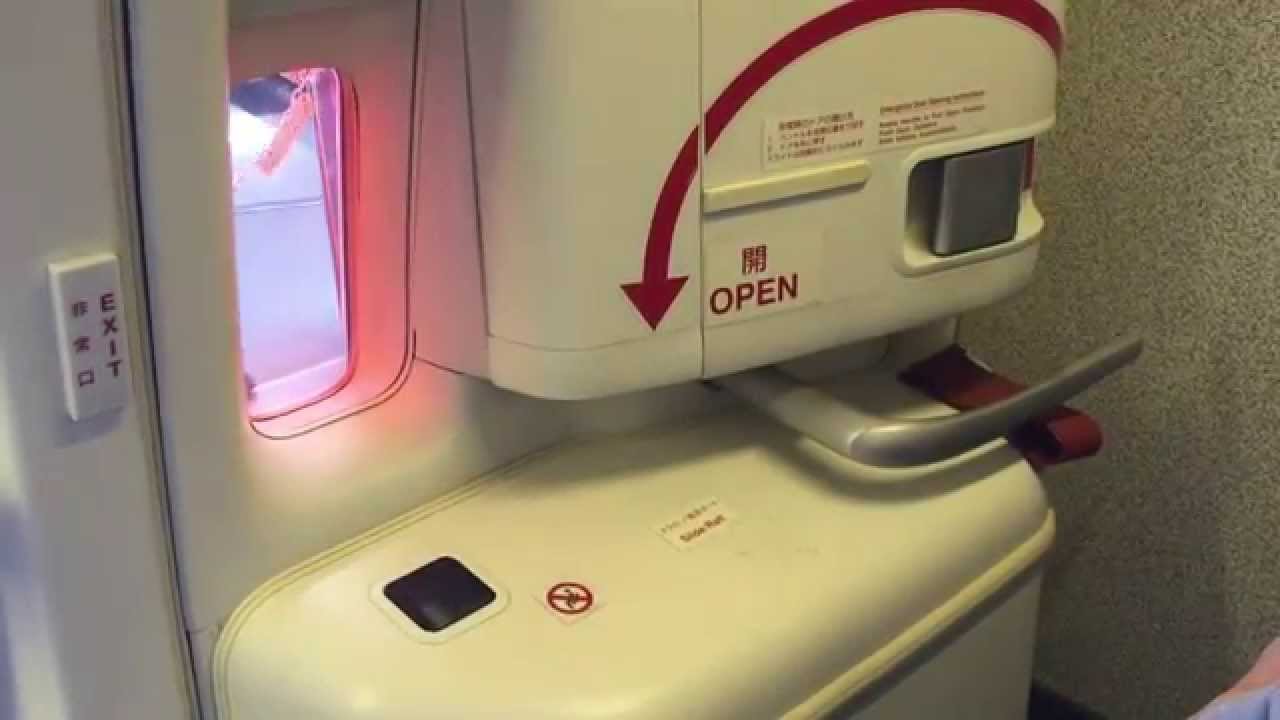 an airplane window with a red light