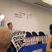 Refugee Activists Storm Stage to Protest British Airways' Policy