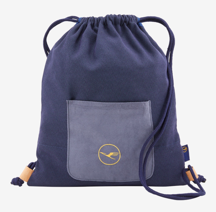 a blue drawstring bag with a yellow logo