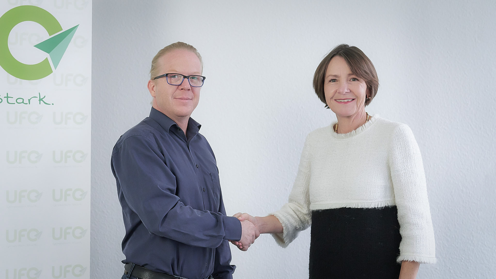 a man and woman shaking hands