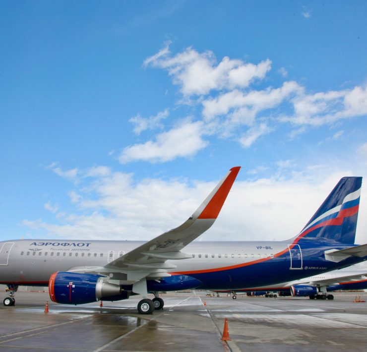 a plane parked on a tarmac