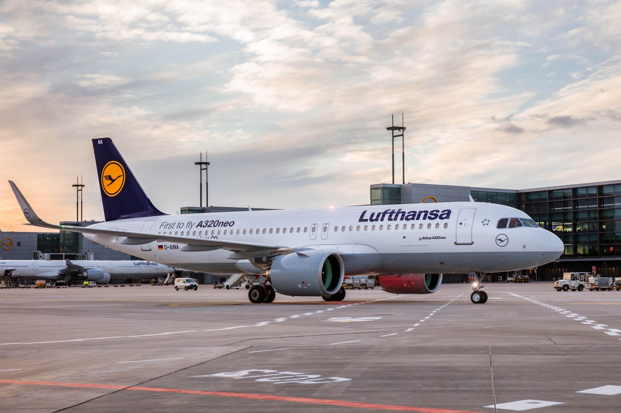 a white airplane on a tarmac