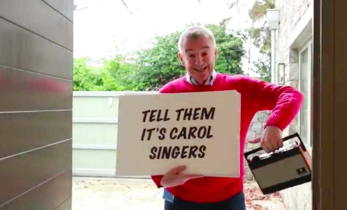 a man holding a sign