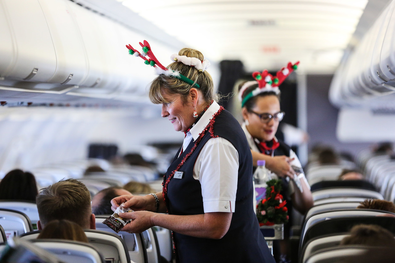 United Airlines Reverses Santa Hat Ban for Flight Attendants But Christmas Jumpe..