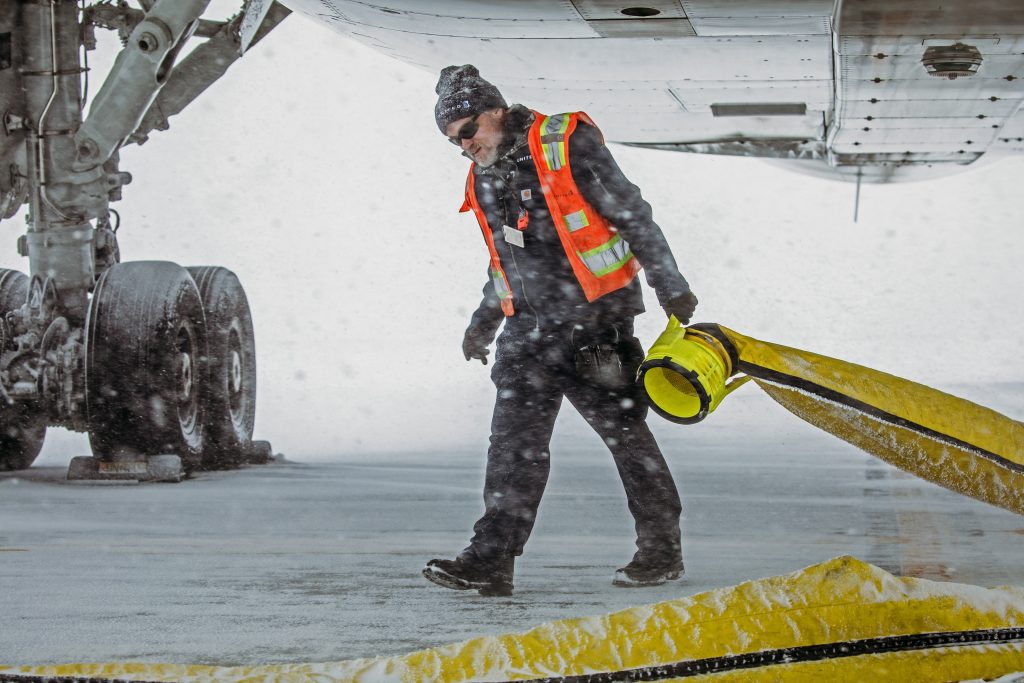 a man walking on a plane