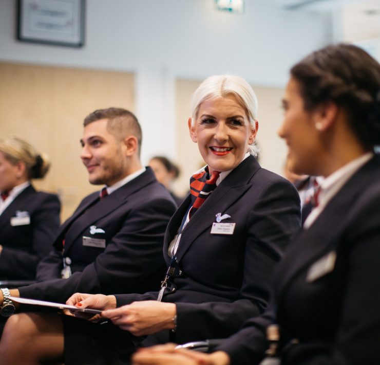 a group of people sitting in chairs