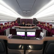 a group of people in maroon uniforms