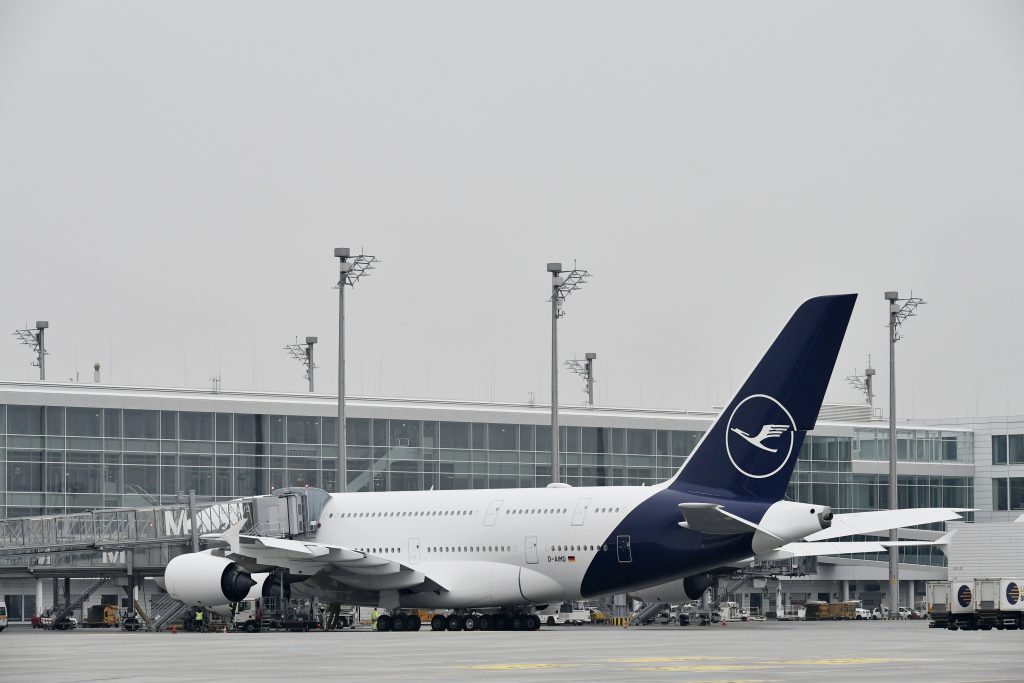 a large airplane parked in a terminal