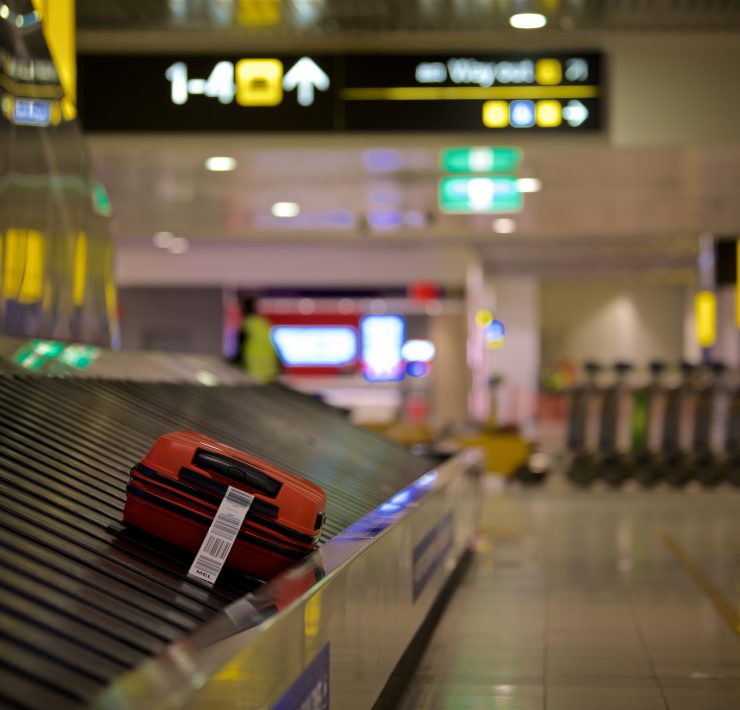 a suitcase on a conveyor belt