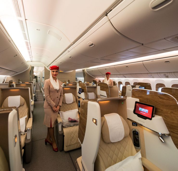 a woman standing in a plane