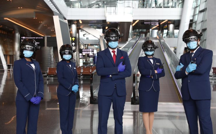 a group of people wearing helmets and gloves