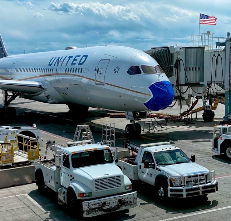 a plane parked at an airport