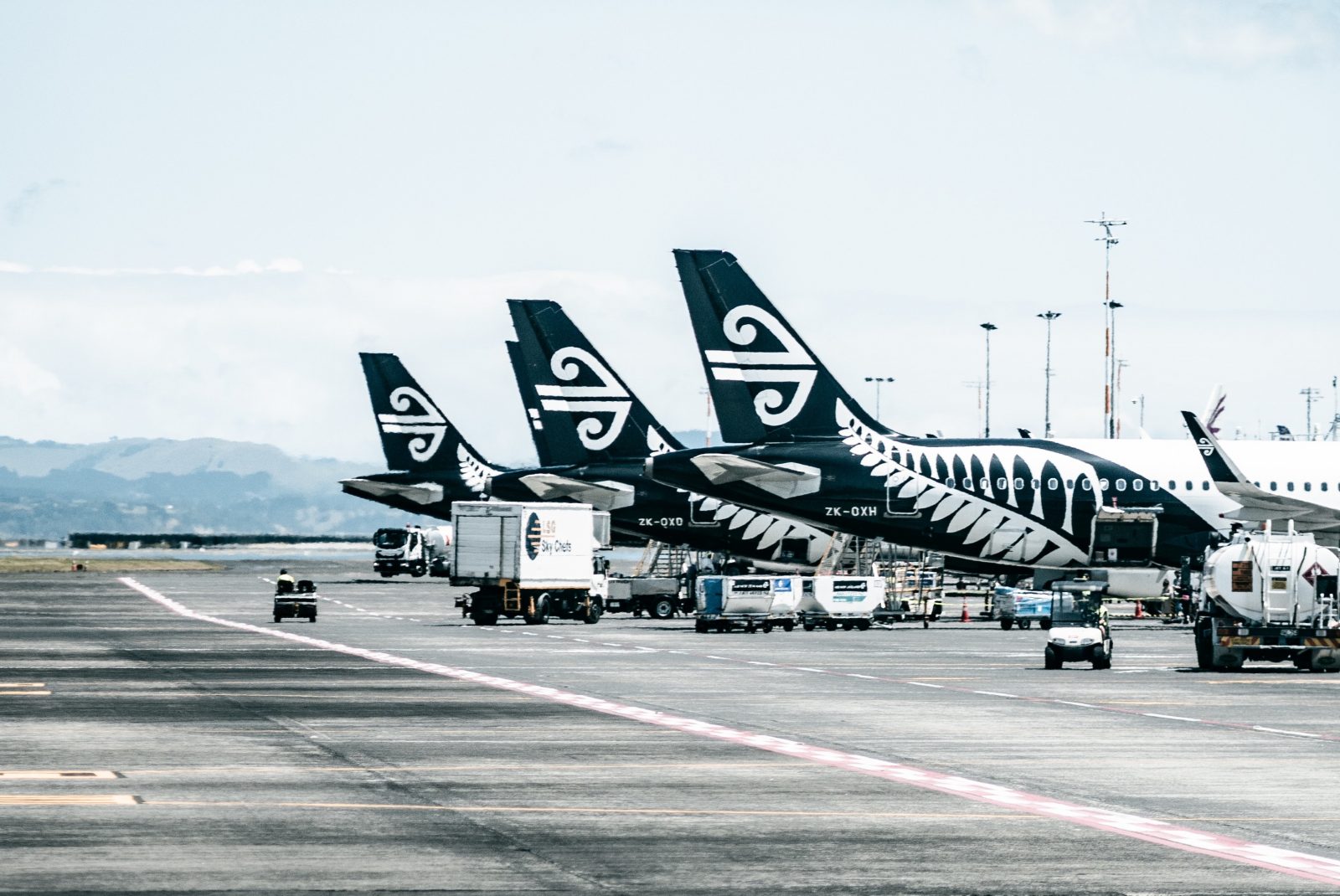 airplanes parked on a runway