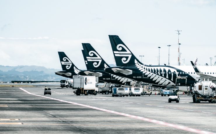 airplanes parked on a runway