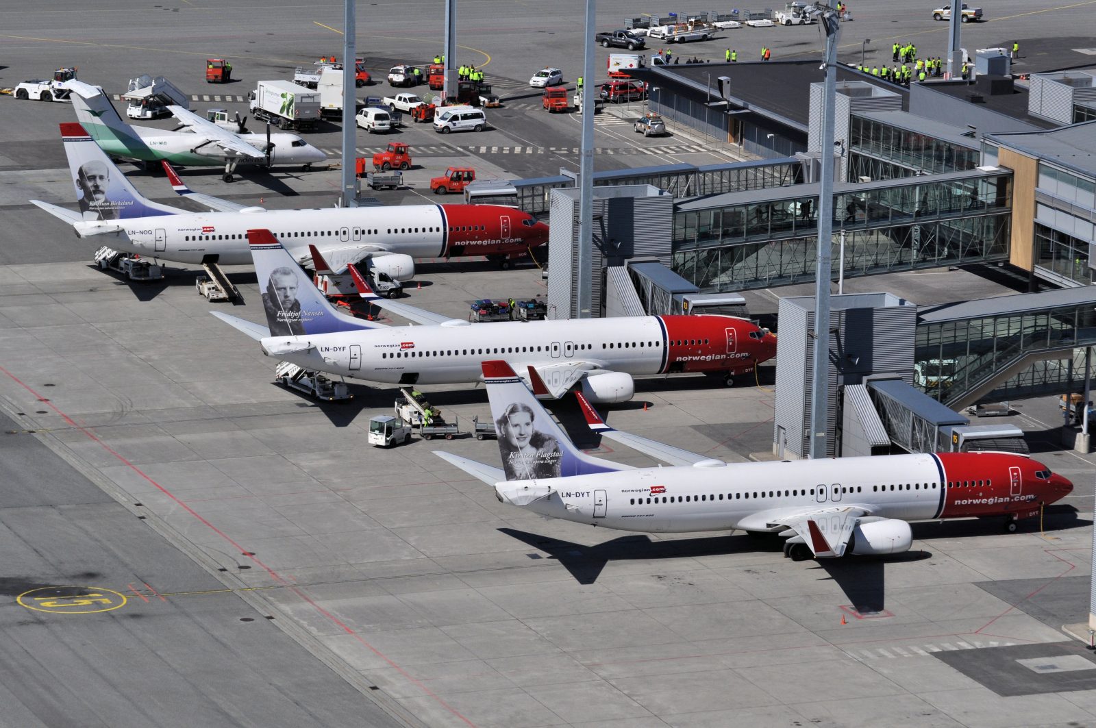 airplanes parked at an airport