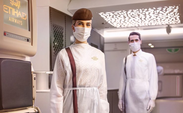 a man wearing a mask and a hat