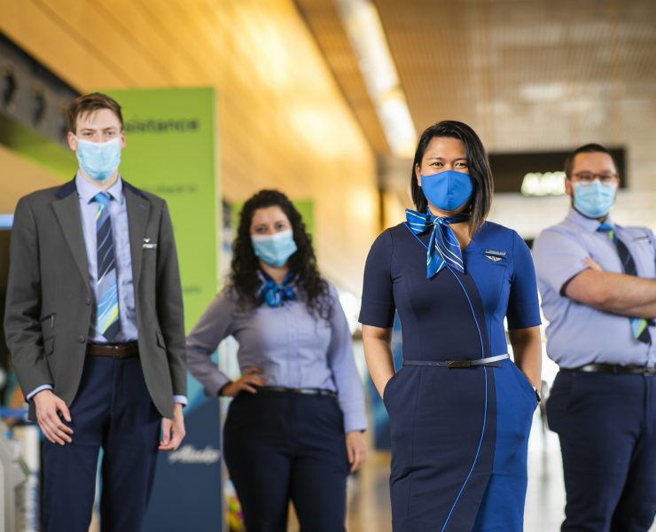 a group of people wearing face masks