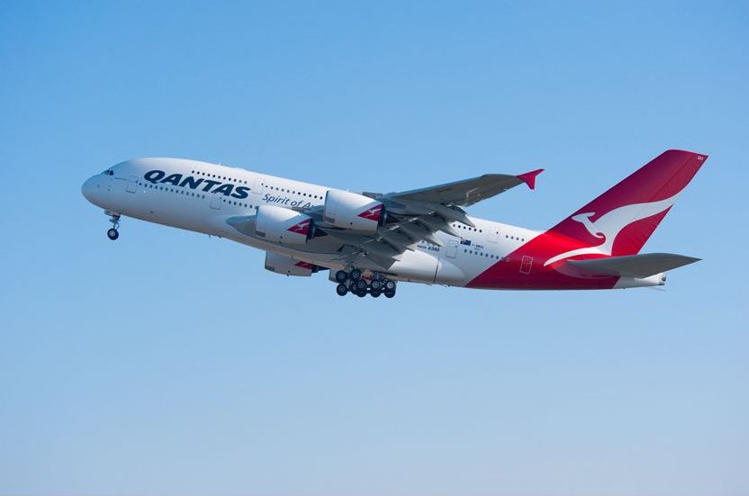 a large airplane flying in the sky