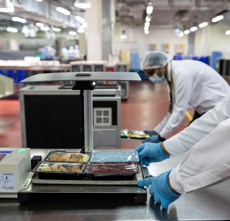 a group of people in a factory