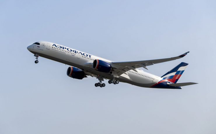 a large airplane flying in the sky