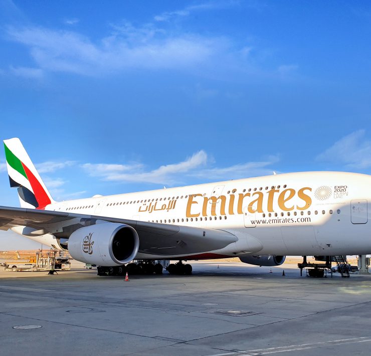 a large white airplane on a tarmac