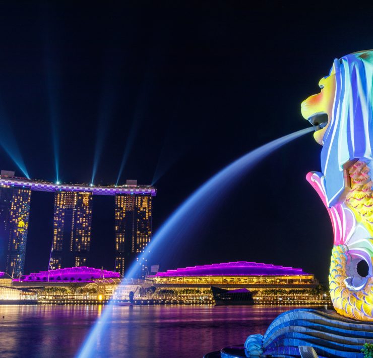 a statue of a mermaid with a water spouting out of it