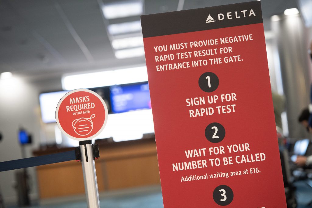 a sign next to a sign