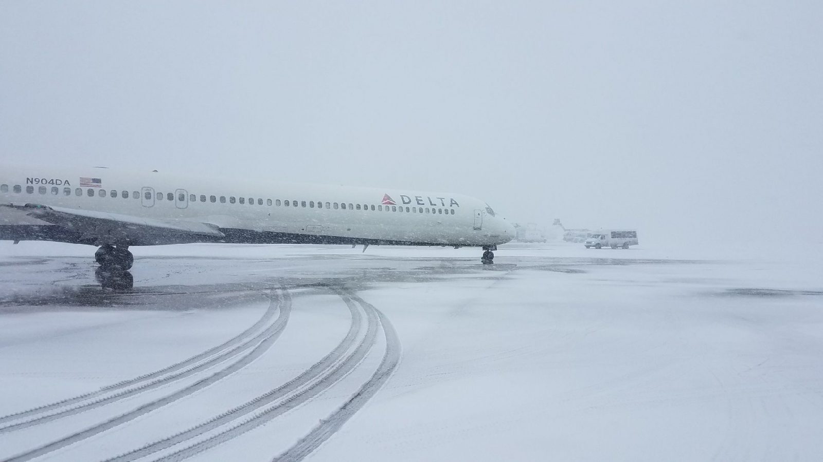 a plane on a snowy runway