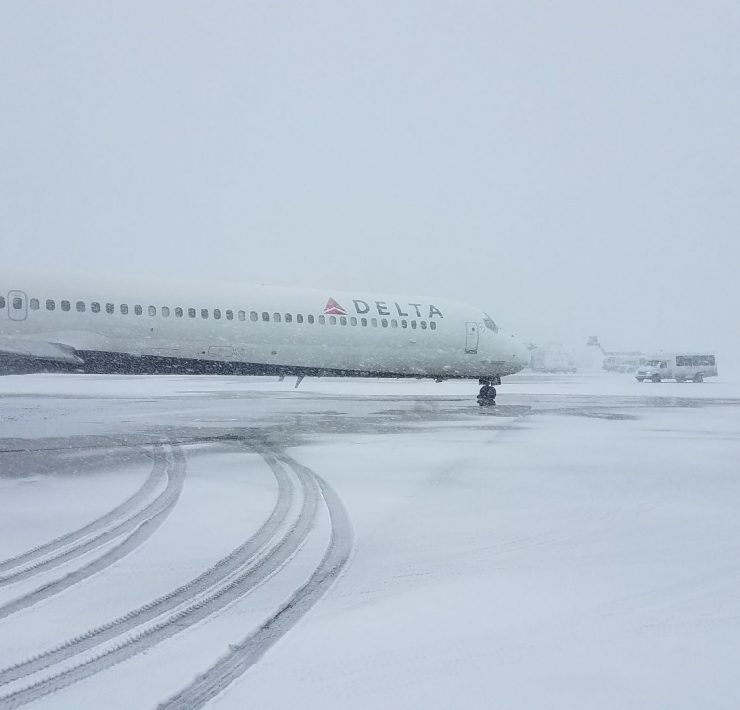 a plane on a snowy runway