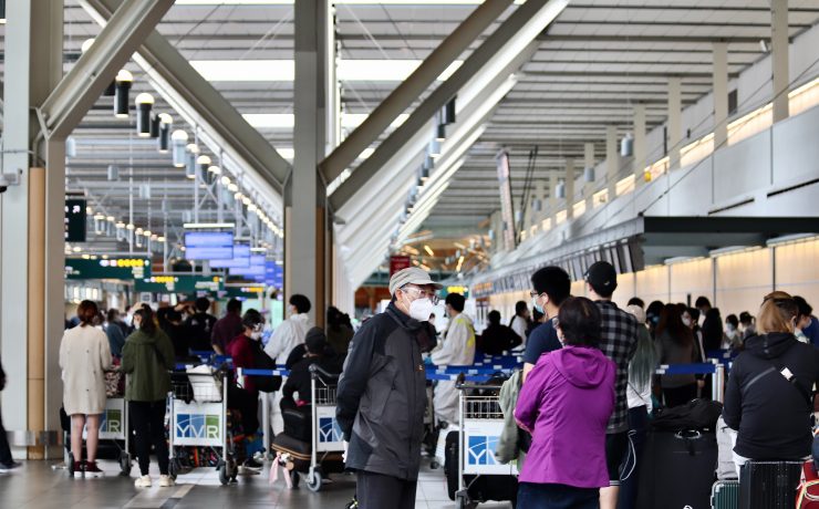 a group of people in a terminal