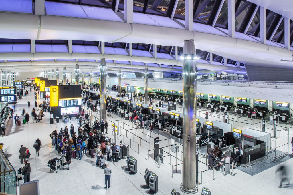 a group of people in an airport