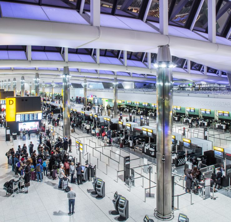 a group of people in an airport