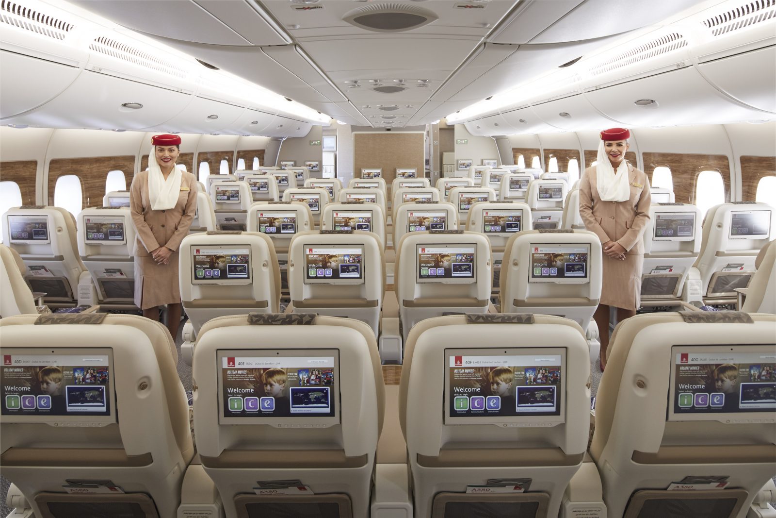 a group of people standing in an airplane