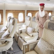 a woman standing in a plane