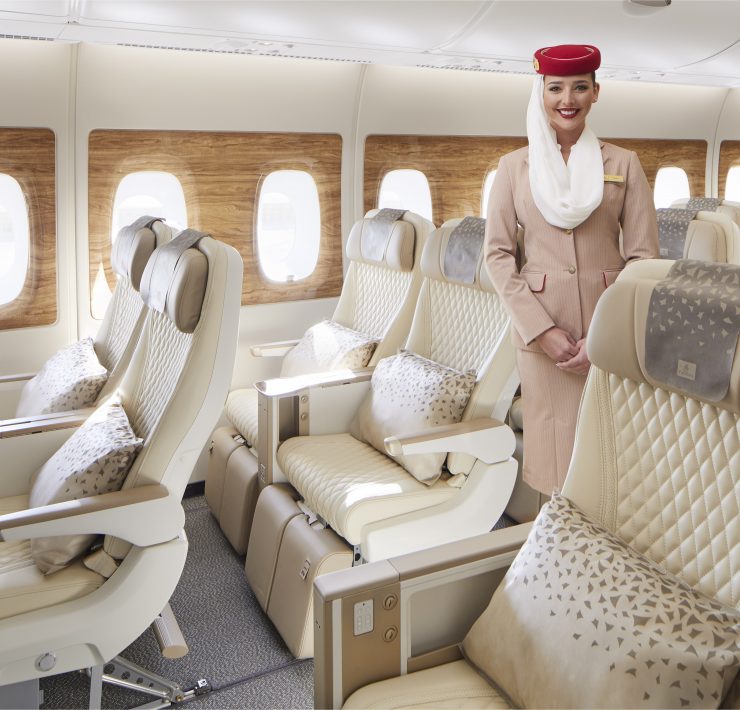 a woman standing in a plane