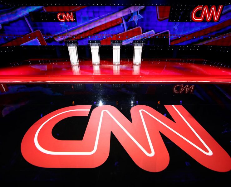 a red and white stage with lights