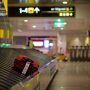 a suitcase on a conveyor belt