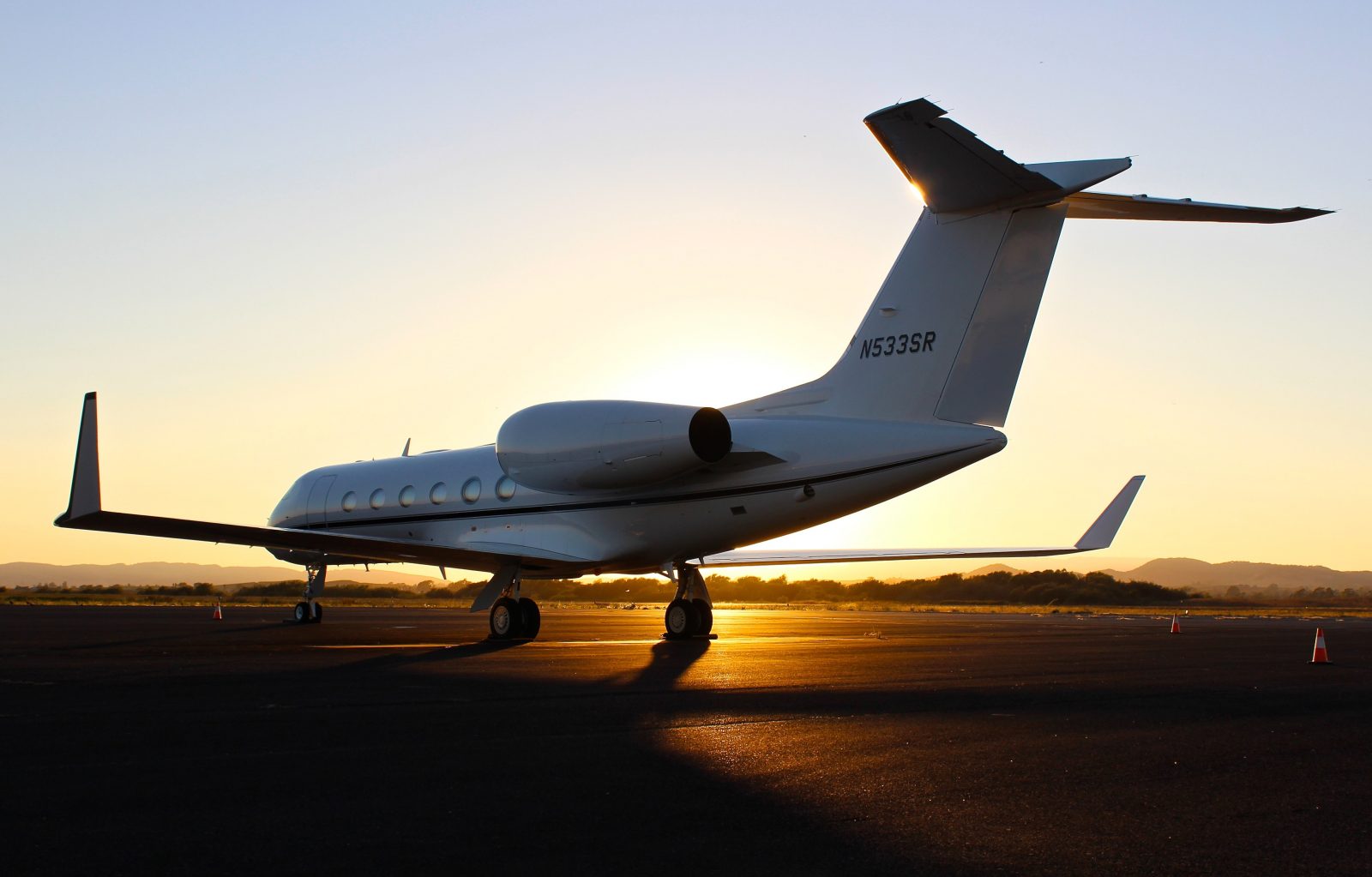 a white airplane on a runway