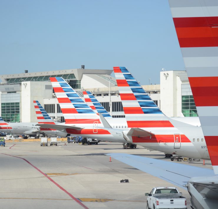 airplanes parked at an airport