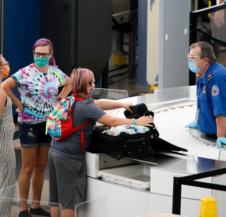 a group of people wearing face masks